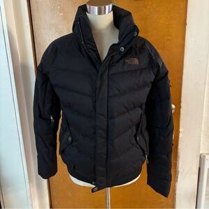 The North Face black winter coat.    Medium